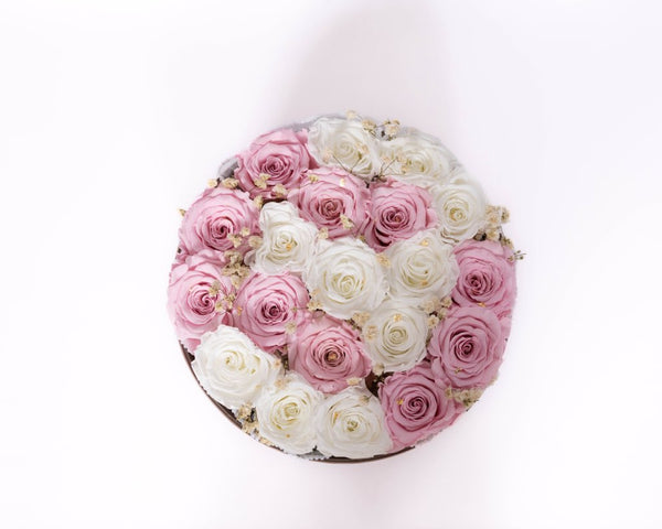 Pink and white love capsule with gold leaves