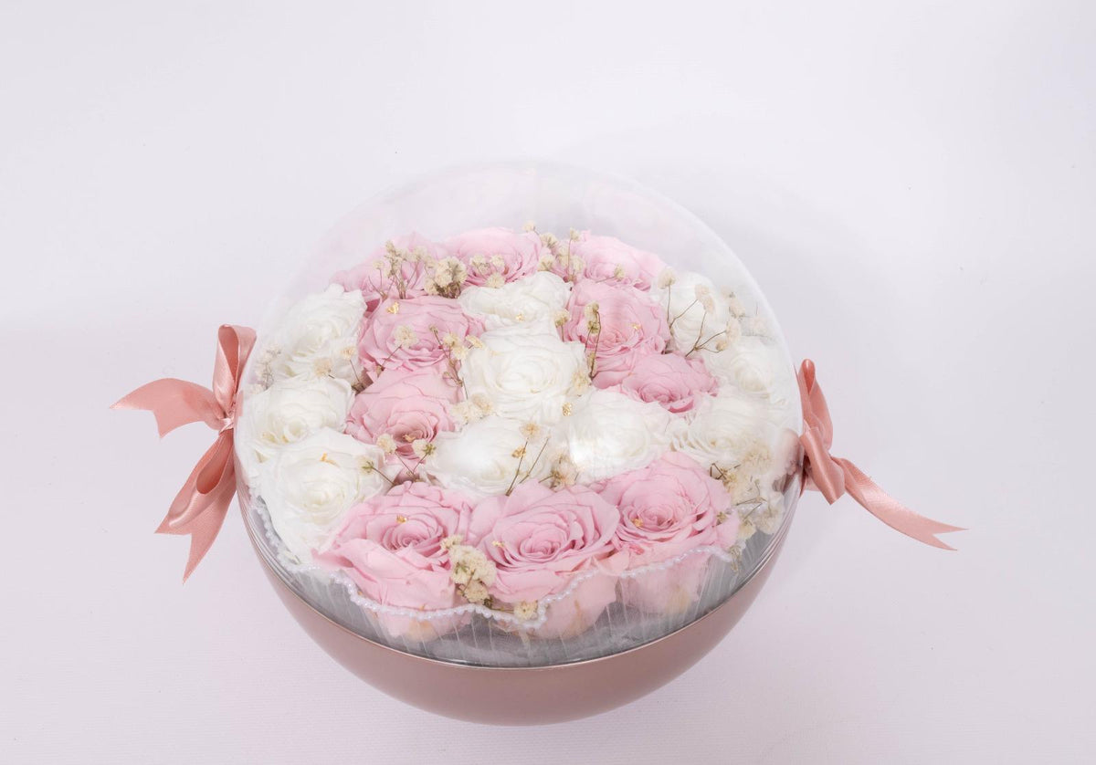 Pink and white love capsule with gold leaves